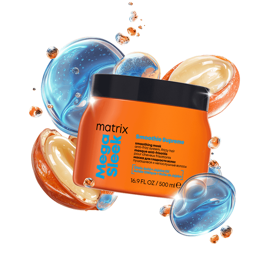 Maska Matrix Mega Sleek z kwasem oleinowym i olejem jojoba na pomarańczowym tle otoczona bąbelkami i połówkami orzechów.